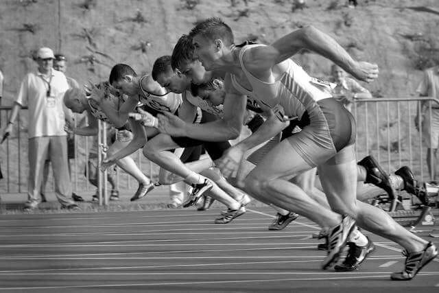 Racer starting to run toward the finish line