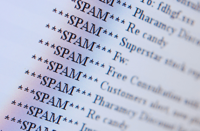 Email inbox showing multiple spam-tagged messages