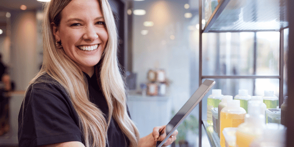 CurePay digital marketing specialist consulting with local business owner in North Texas